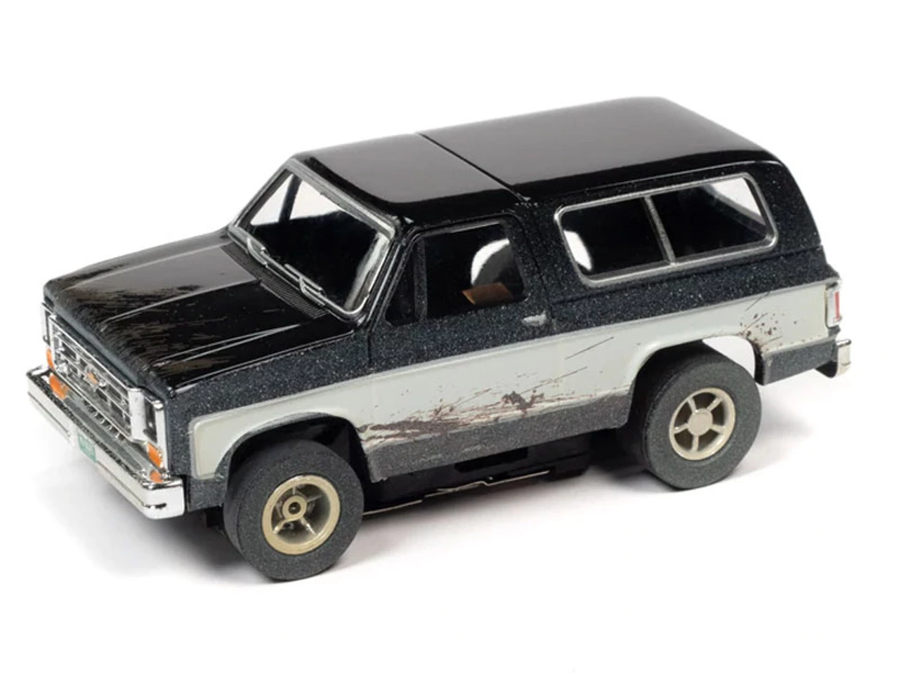 Auto World 1977 Chevrolet Blazer (Black/White) X-Traction R1 HO Slot Car